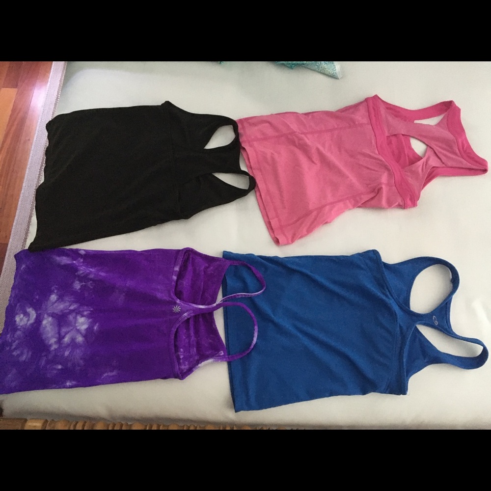 Bundle of athletic yoga tanks with built in bras.